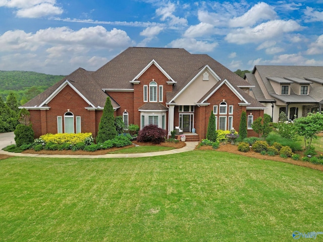 1176 N Lake Forest Dr, Southside, AL 35907 - craftsman inspired home featuring brick siding, a shingled roof, and a front yard