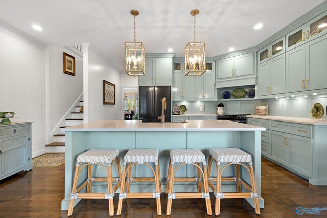 1176 N Lake Forest Dr, Southside, AL 35907 - kitchen with recessed lighting, light countertops, a sink, stainless steel fridge, and black range with electric cooktop