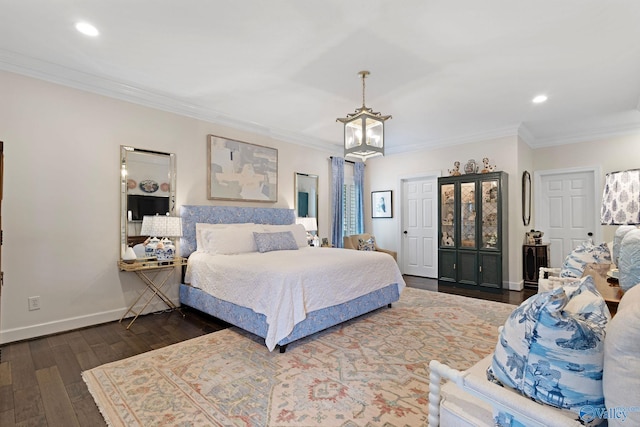 1176 N Lake Forest Dr, Southside, AL 35907 - bedroom with dark wood finished floors, crown molding, and recessed lighting