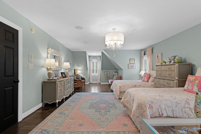 1176 N Lake Forest Dr, Southside, AL 35907 - bedroom with a chandelier, dark wood finished floors, and baseboards