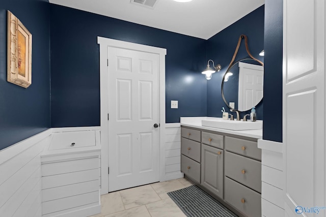 1176 N Lake Forest Dr, Southside, AL 35907 - bathroom with wainscoting, marble finish floor, and vanity
