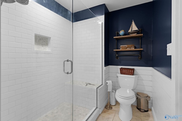 1176 N Lake Forest Dr, Southside, AL 35907 - bathroom with a shower stall, a wainscoted wall, and toilet
