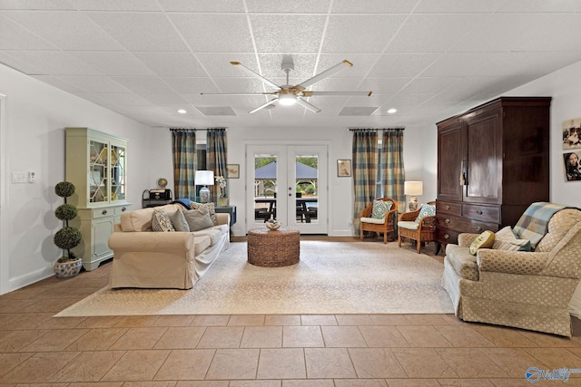 1176 N Lake Forest Dr, Southside, AL 35907 - living room with french doors, a ceiling fan, baseboards, and a drop ceiling