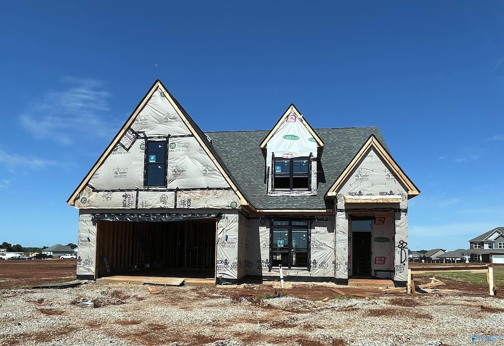 82 Dylan Rd, Madison, AL 35756 - property in mid-construction featuring roof with shingles and a garage