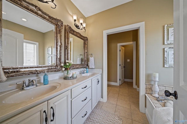 bathroom with tile patterned flooring and vanity