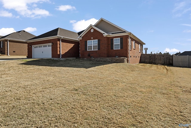 ranch-style house with a front lawn and a garage