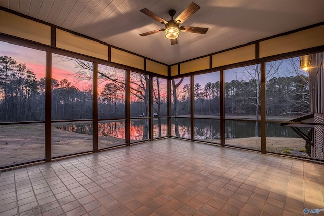 unfurnished sunroom with a wall of windows