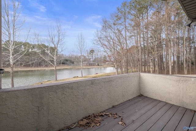 deck featuring a water view