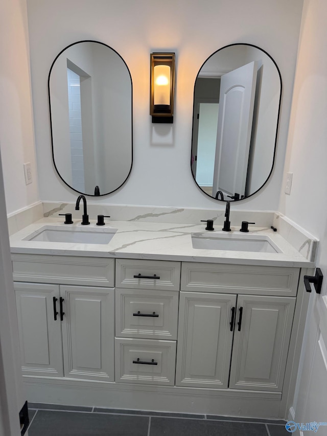 bathroom with vanity and tile patterned floors