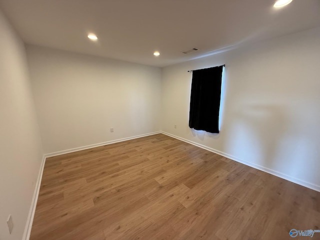 empty room featuring light hardwood / wood-style floors