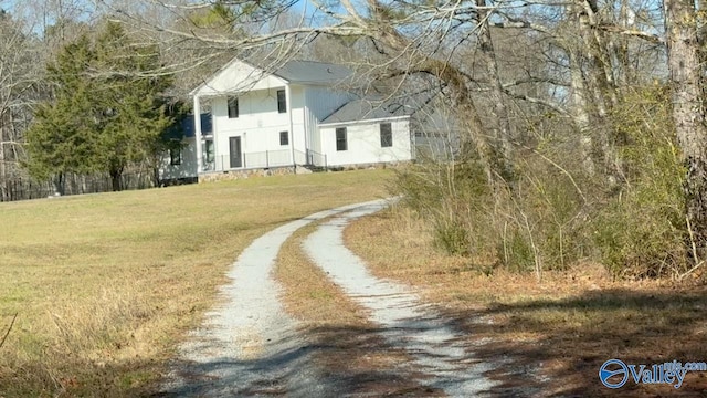 exterior space featuring a front yard