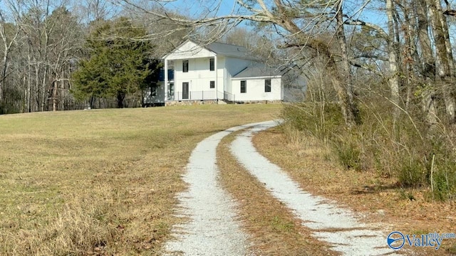 view of front of home with a front lawn