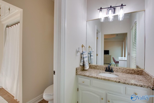 full bathroom with vanity, tile patterned floors, and toilet