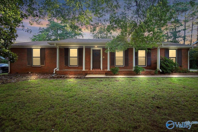 210 Spring Valley Ct SW, Huntsville, AL 35802 - ranch-style house featuring a front yard, brick siding, and covered porch