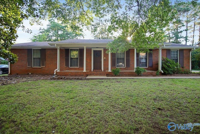 210 Spring Valley Ct SW, Huntsville, AL 35802 - ranch-style home with a front yard, brick siding, and covered porch