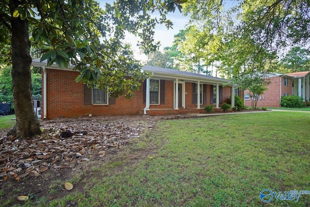 210 Spring Valley Ct SW, Huntsville, AL 35802 - ranch-style home with a front lawn and brick siding