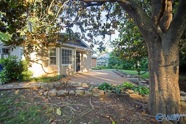 210 Spring Valley Ct SW, Huntsville, AL 35802 - view of property exterior featuring a patio area