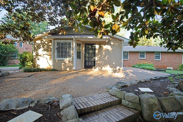 210 Spring Valley Ct SW, Huntsville, AL 35802 - rear view of property featuring brick siding
