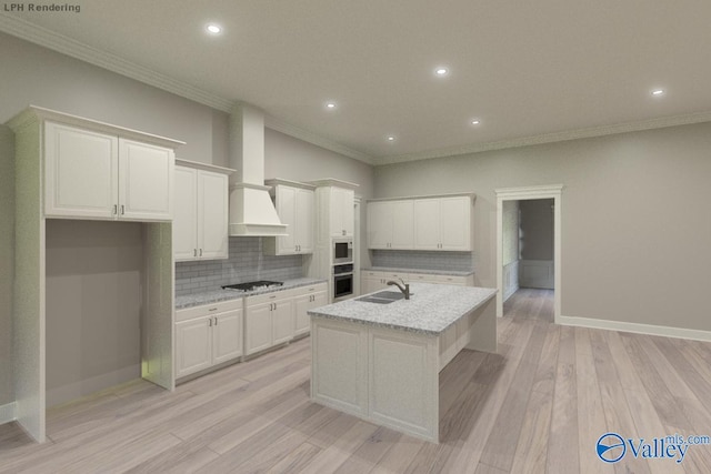 MCKINLEY-A1 Capshaw Rd, Athens, AL 35613 - kitchen featuring gas cooktop, ornamental molding, a sink, tasteful backsplash, and an island with sink
