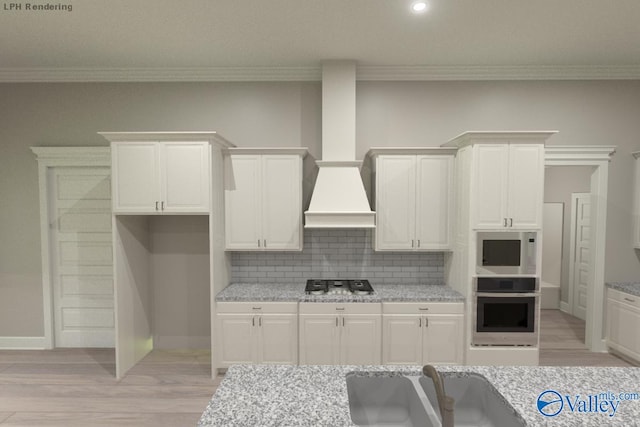 MCKINLEY-A1 Capshaw Rd, Athens, AL 35613 - kitchen featuring appliances with stainless steel finishes, white cabinets, a sink, ornamental molding, and decorative backsplash
