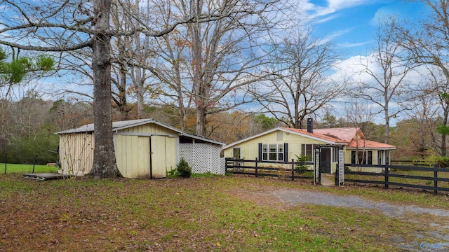 exterior space with an outbuilding