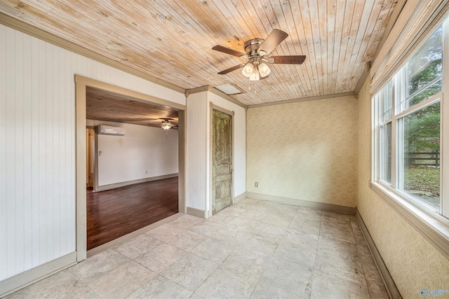 spare room with light wood-type flooring, an AC wall unit, a healthy amount of sunlight, and wood ceiling