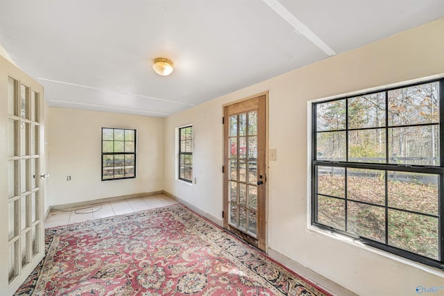 view of tiled spare room