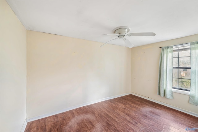 unfurnished room with ceiling fan and hardwood / wood-style floors