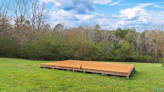 view of property's community with a lawn