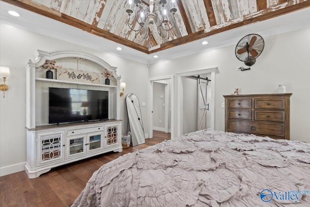 bedroom featuring dark wood-style floors, crown molding, recessed lighting, a barn door, and baseboards