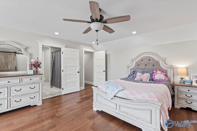 bedroom with a textured ceiling, recessed lighting, a ceiling fan, vaulted ceiling, and dark wood-style floors