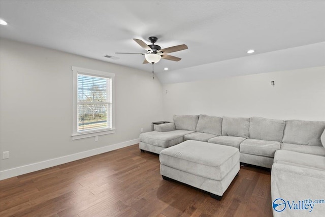 living room featuring baseboards, a ceiling fan, dark wood-style floors, vaulted ceiling, and recessed lighting