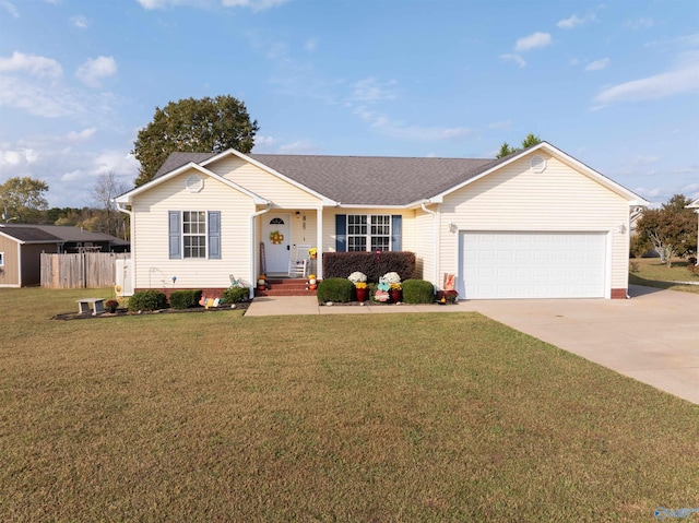 single story home with a front yard and a garage