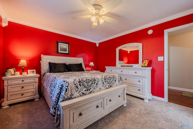 bedroom with ceiling fan, crown molding, and dark colored carpet