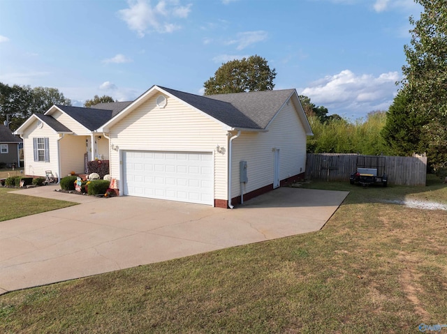 ranch-style house with a front yard and a garage