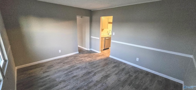 empty room with dark hardwood / wood-style floors
