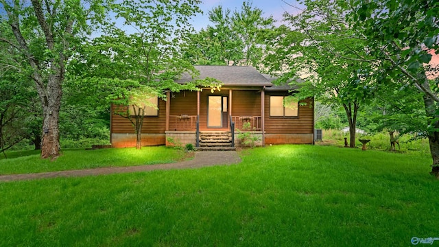 132 Butch Cir, Hazel Green, AL 35750 - view of front of home with a porch and a front yard