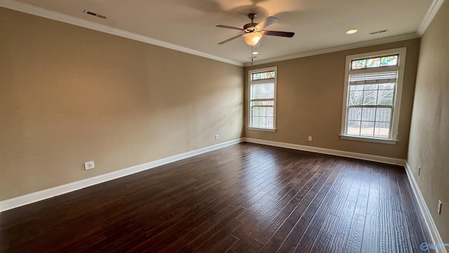 empty room featuring dark wood-type flooring, ceiling fan, and crown molding