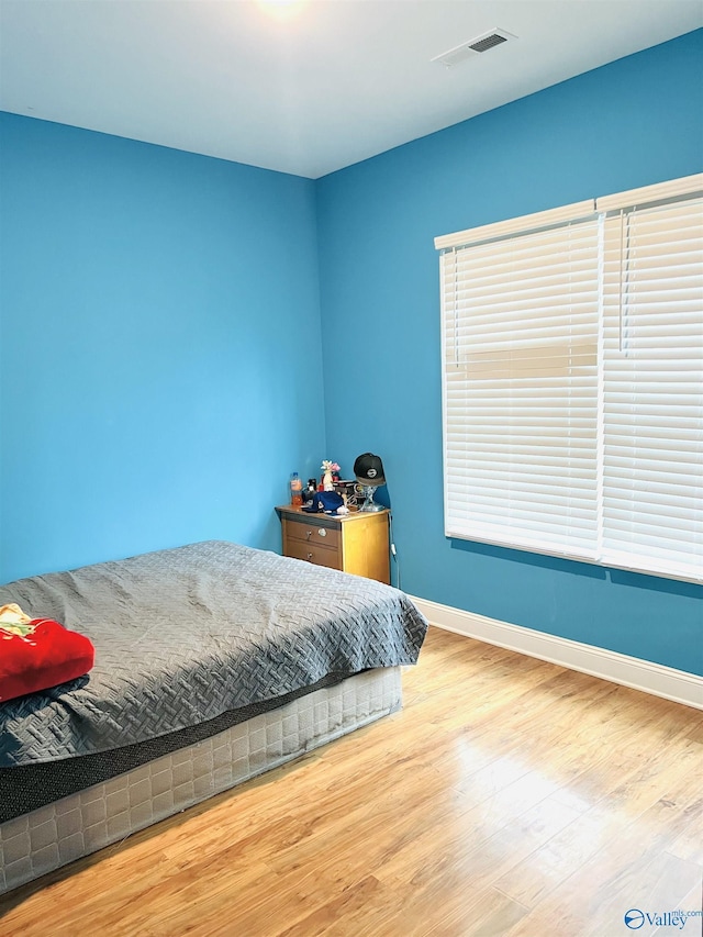 bedroom featuring light hardwood / wood-style flooring