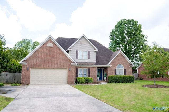 1508 Berrivine Dr, Hartselle, AL 35640 - traditional home with brick siding, driveway, a garage, and a shingled roof