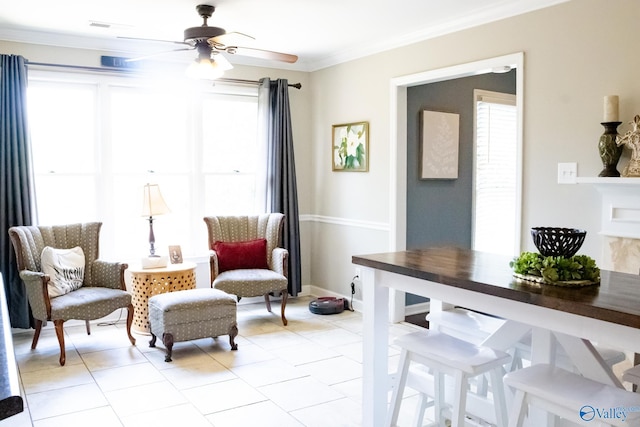 1508 Berrivine Dr, Hartselle, AL 35640 - living area featuring ceiling fan, crown molding, light tile patterned floors, and baseboards