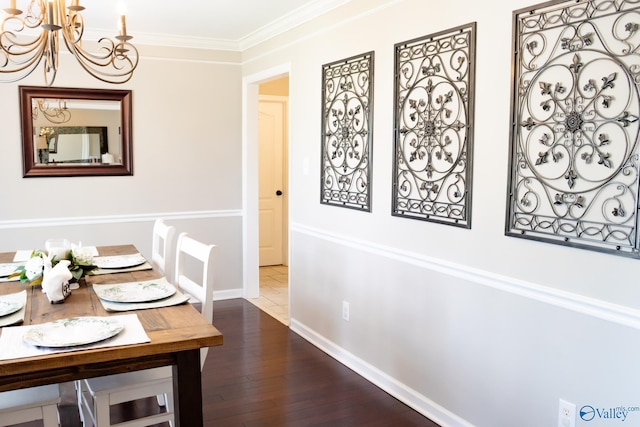 1508 Berrivine Dr, Hartselle, AL 35640 - dining space with a chandelier, dark wood-style flooring, crown molding, and baseboards