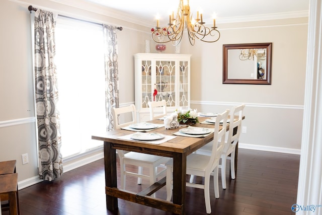 1508 Berrivine Dr, Hartselle, AL 35640 - dining area with a chandelier, dark wood finished floors, ornamental molding, and baseboards