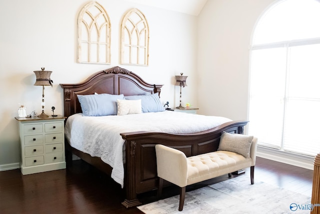 1508 Berrivine Dr, Hartselle, AL 35640 - bedroom with wood finished floors, lofted ceiling, and baseboards