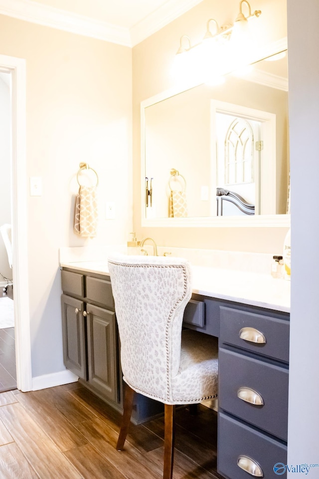 1508 Berrivine Dr, Hartselle, AL 35640 - bathroom featuring crown molding, wood finished floors, vanity, and baseboards