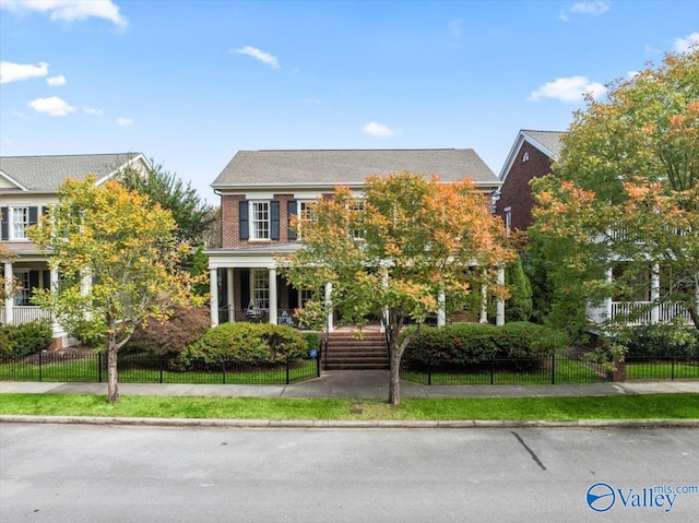 view of front of property featuring covered porch