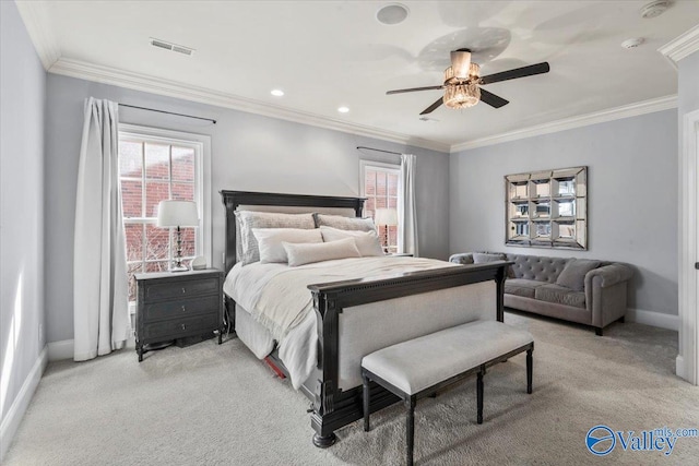 bedroom featuring ceiling fan, ornamental molding, and light colored carpet