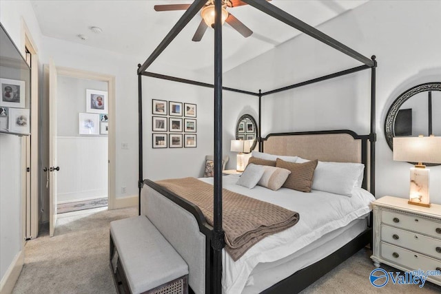 bedroom with light colored carpet and ceiling fan