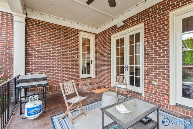 view of patio / terrace featuring ceiling fan and a grill