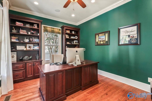 office area with ceiling fan, ornamental molding, and light wood-type flooring